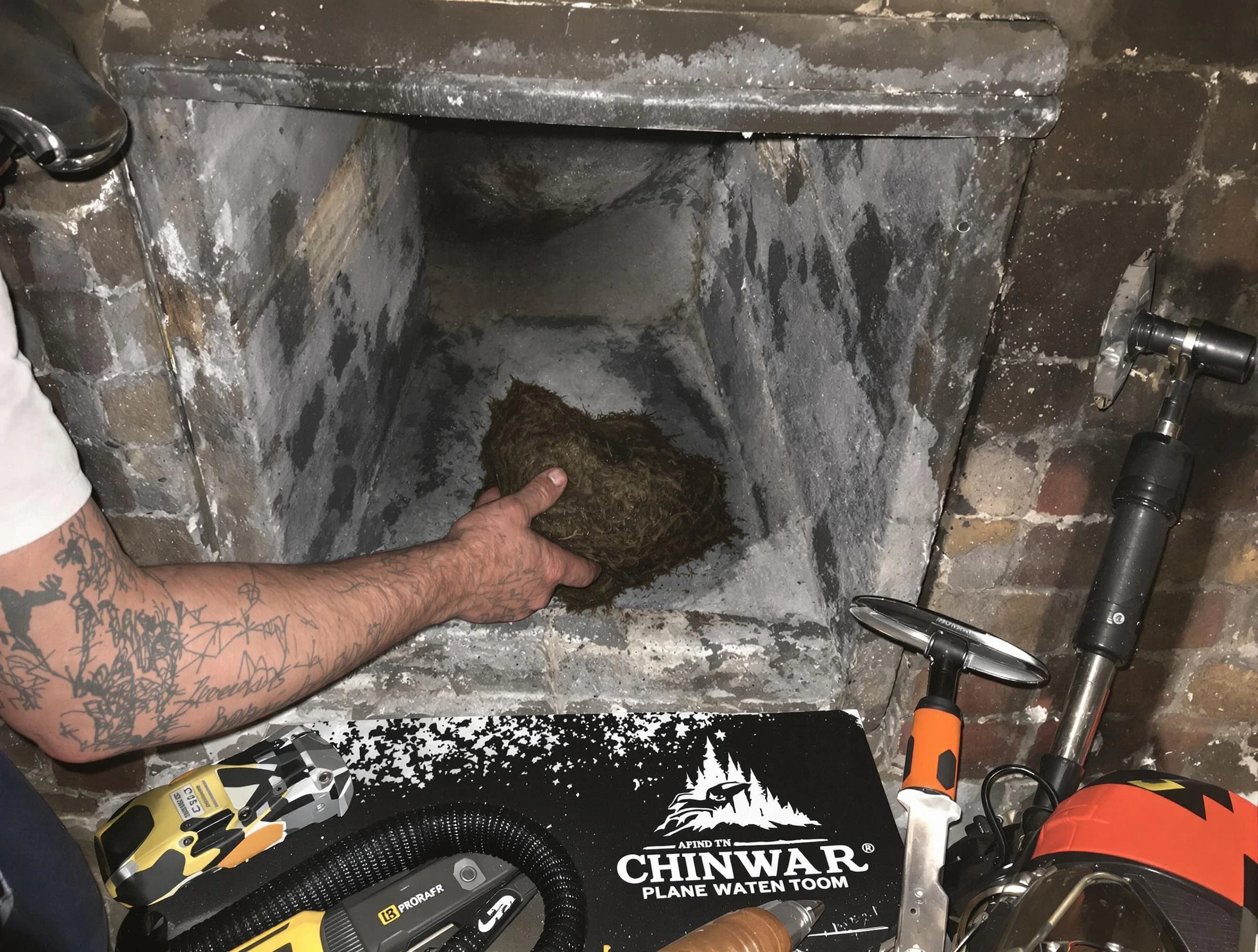 Glendale Chimney Sweep safely removing debris and screening chimney in Glendale, AZ