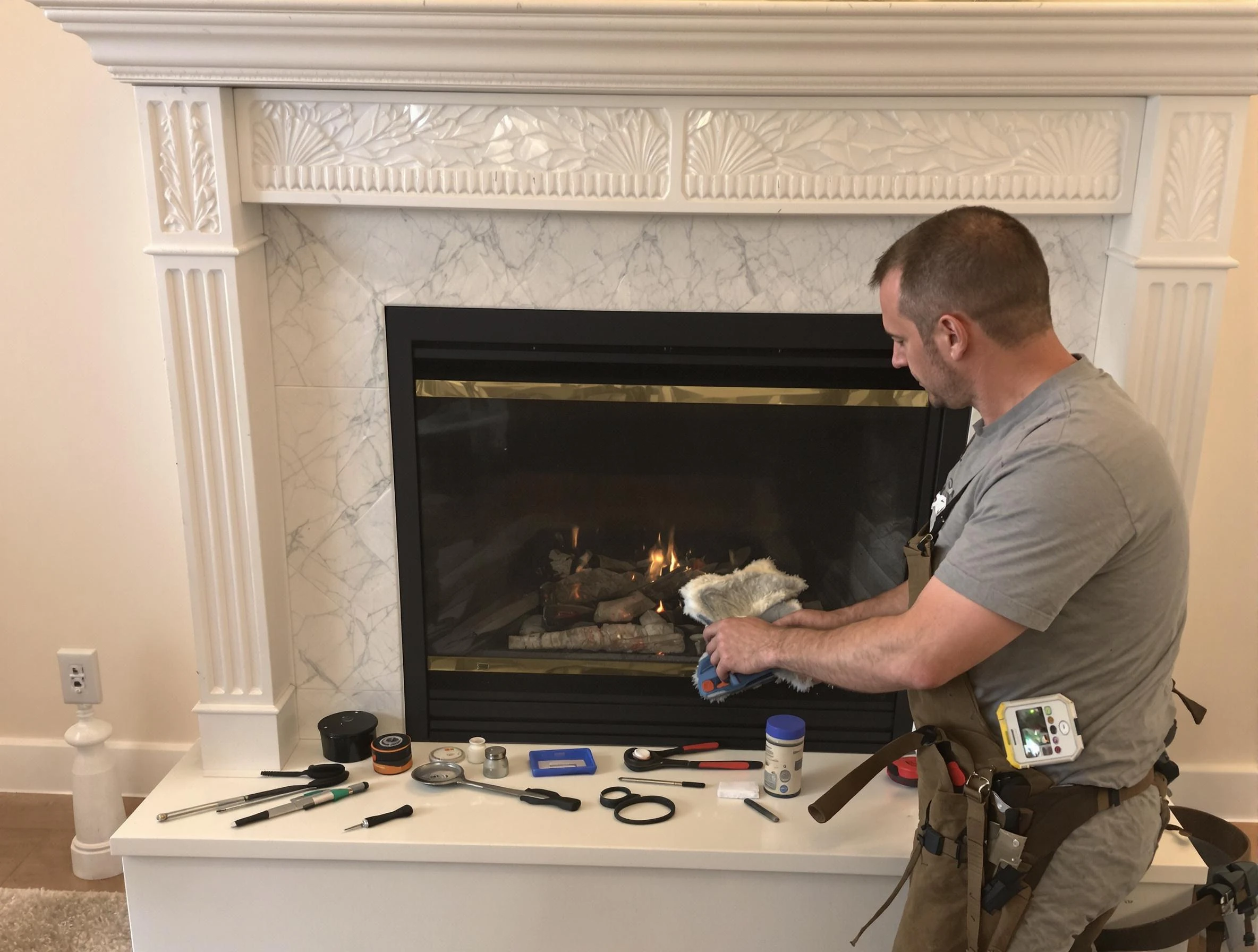 Glendale Chimney Sweep performing fireplace maintenance in Glendale, AZ